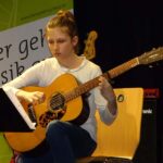 E-Gitarre, E-Bass & Gitarre on stage
